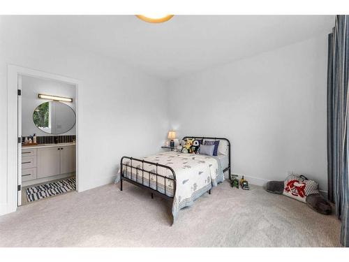 83 Lissington Drive Sw, Calgary, AB - Indoor Photo Showing Bedroom