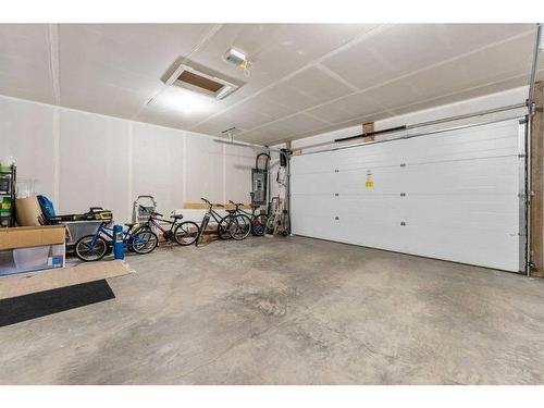 83 Lissington Drive Sw, Calgary, AB - Indoor Photo Showing Garage