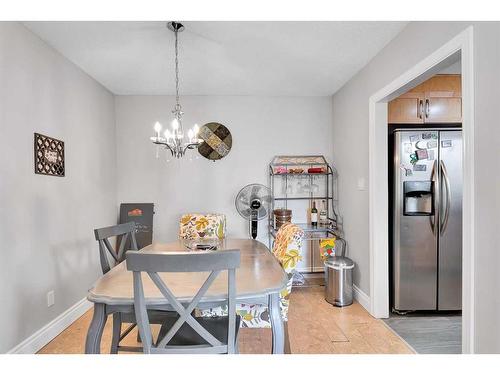 410-3730 50 Street Nw, Calgary, AB - Indoor Photo Showing Dining Room