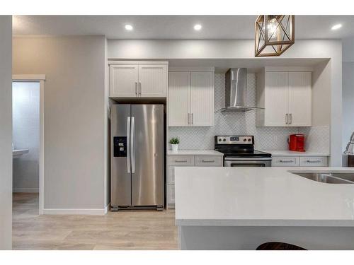 51 Masters Square Se, Calgary, AB - Indoor Photo Showing Kitchen With Stainless Steel Kitchen With Upgraded Kitchen