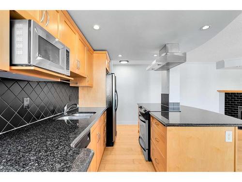 803-1225 15 Avenue Sw, Calgary, AB - Indoor Photo Showing Kitchen With Double Sink