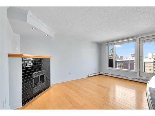 803-1225 15 Avenue Sw, Calgary, AB - Indoor With Fireplace