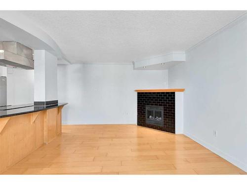 803-1225 15 Avenue Sw, Calgary, AB - Indoor With Fireplace