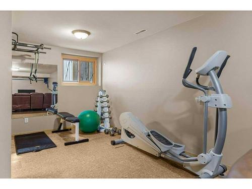 204 Cougar Point Road, Canmore, AB - Indoor Photo Showing Gym Room