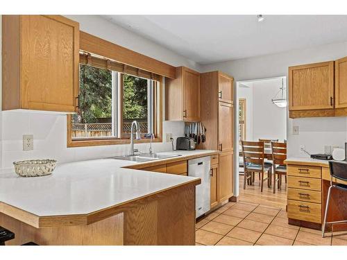 204 Cougar Point Road, Canmore, AB - Indoor Photo Showing Kitchen With Double Sink