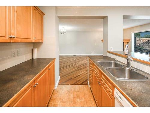 59 Somerset Manor Sw, Calgary, AB - Indoor Photo Showing Kitchen With Double Sink