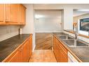 59 Somerset Manor Sw, Calgary, AB  - Indoor Photo Showing Kitchen With Double Sink 