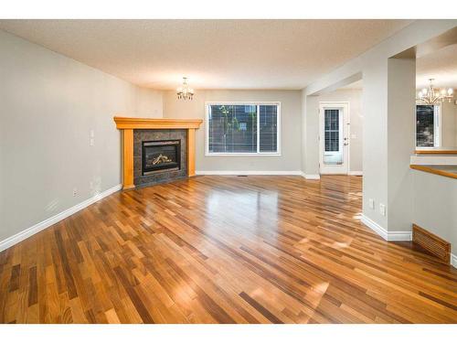 59 Somerset Manor Sw, Calgary, AB - Indoor Photo Showing Living Room With Fireplace