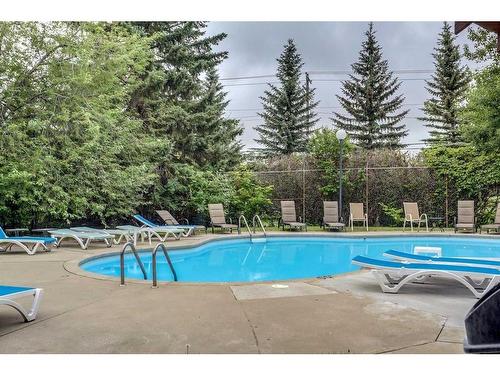 603-3316 Rideau Place Sw, Calgary, AB - Outdoor With In Ground Pool With Backyard