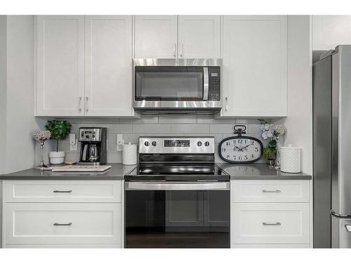 855 Cranston Avenue Se, Calgary, AB - Indoor Photo Showing Kitchen With Stainless Steel Kitchen With Upgraded Kitchen