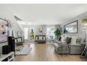 855 Cranston Avenue Se, Calgary, AB  - Indoor Photo Showing Living Room 