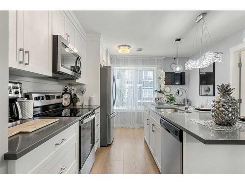 855 Cranston Avenue Se, Calgary, AB - Indoor Photo Showing Kitchen With Stainless Steel Kitchen With Upgraded Kitchen