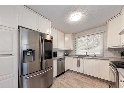 7136 Temple Drive Ne, Calgary, AB - Indoor Photo Showing Kitchen With Stainless Steel Kitchen With Upgraded Kitchen