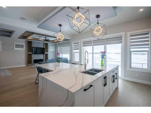 62 Waterford Road, Chestermere, AB - Indoor Photo Showing Kitchen With Double Sink With Upgraded Kitchen