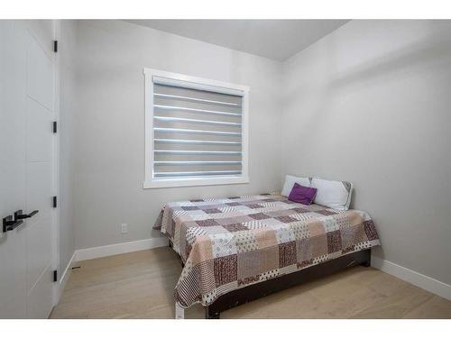 62 Waterford Road, Chestermere, AB - Indoor Photo Showing Bedroom