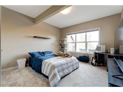 80 Riviera Crescent, Cochrane, AB - Indoor Photo Showing Bedroom