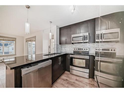 6406-155 Skyview Ranch Way Ne, Calgary, AB - Indoor Photo Showing Kitchen With Stainless Steel Kitchen With Upgraded Kitchen