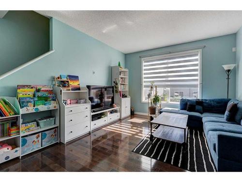 404-10 Auburn Bay Avenue Se, Calgary, AB - Indoor Photo Showing Living Room