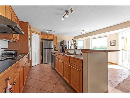 9 Panorama Hills Manor Nw, Calgary, AB - Indoor Photo Showing Kitchen With Double Sink