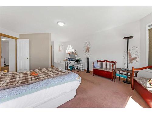 9 Panorama Hills Manor Nw, Calgary, AB - Indoor Photo Showing Bedroom