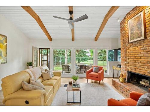 260-20 Midpark Crescent Se, Calgary, AB - Indoor Photo Showing Living Room With Fireplace