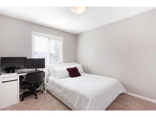 2060 New Brighton Grove Se, Calgary, AB - Indoor Photo Showing Bedroom