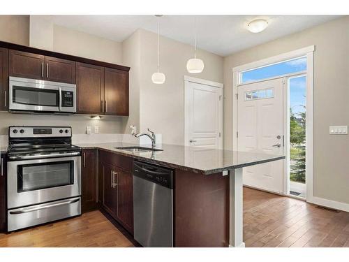 1802 Evanston Square Nw, Calgary, AB - Indoor Photo Showing Kitchen With Stainless Steel Kitchen