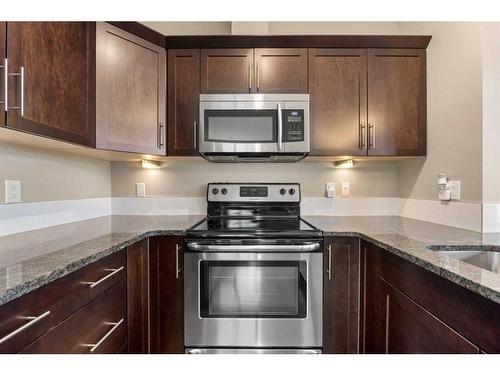 1802 Evanston Square Nw, Calgary, AB - Indoor Photo Showing Kitchen With Stainless Steel Kitchen