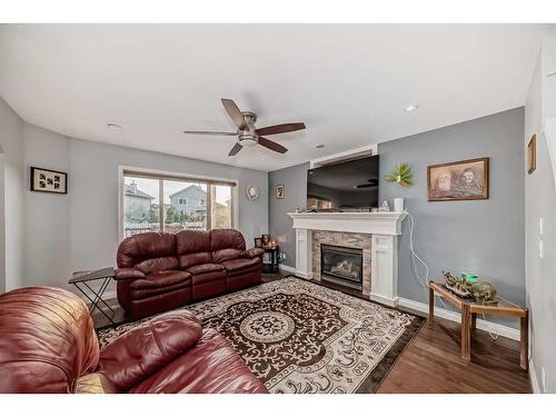 8222 Saddleridge Drive Ne, Calgary, AB - Indoor Photo Showing Living Room With Fireplace