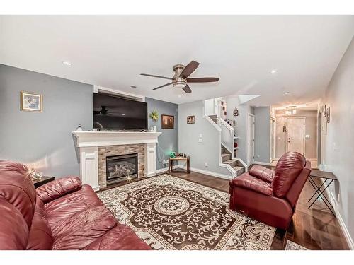 8222 Saddleridge Drive Ne, Calgary, AB - Indoor Photo Showing Living Room With Fireplace