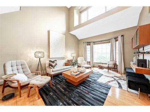 123 Woodhaven Bay Sw, Calgary, AB - Indoor Photo Showing Living Room With Fireplace