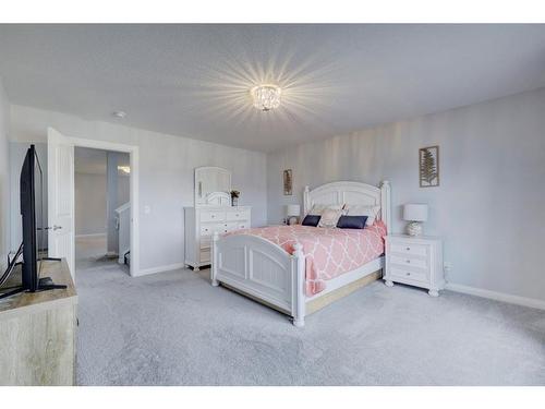 427 Rivercrest Boulevard, Cochrane, AB - Indoor Photo Showing Bedroom