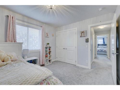 427 Rivercrest Boulevard, Cochrane, AB - Indoor Photo Showing Bedroom