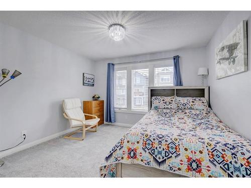 427 Rivercrest Boulevard, Cochrane, AB - Indoor Photo Showing Bedroom