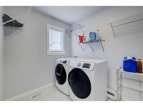 427 Rivercrest Boulevard, Cochrane, AB - Indoor Photo Showing Laundry Room