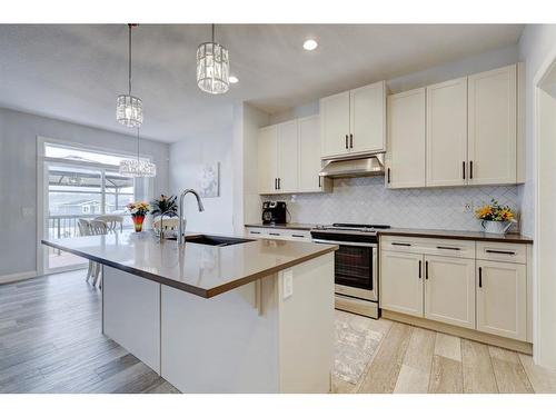 427 Rivercrest Boulevard, Cochrane, AB - Indoor Photo Showing Kitchen