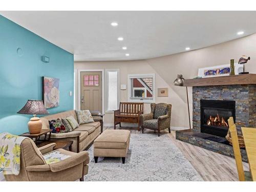 929 17Th Street, Canmore, AB - Indoor Photo Showing Living Room With Fireplace