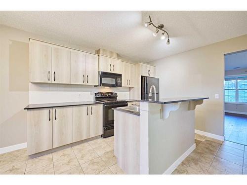 123 Panora Square Nw, Calgary, AB - Indoor Photo Showing Kitchen