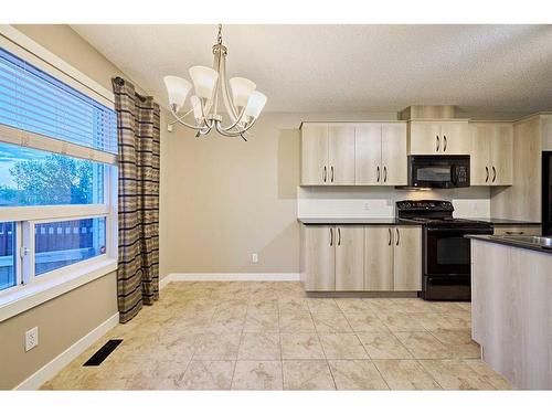 123 Panora Square Nw, Calgary, AB - Indoor Photo Showing Kitchen