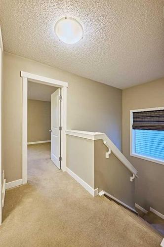 123 Panora Square Nw, Calgary, AB - Indoor Photo Showing Other Room