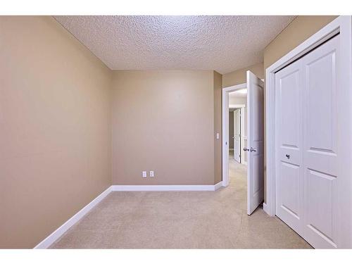 123 Panora Square Nw, Calgary, AB - Indoor Photo Showing Other Room