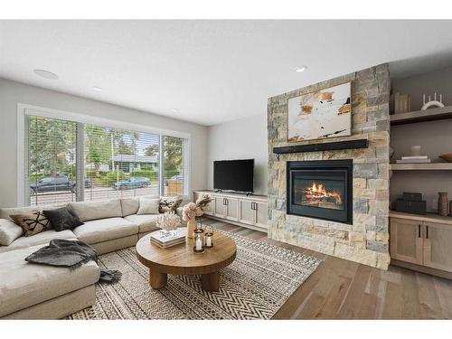 2836 12 Avenue Nw, Calgary, AB - Indoor Photo Showing Living Room With Fireplace