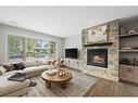 2836 12 Avenue Nw, Calgary, AB  - Indoor Photo Showing Living Room With Fireplace 