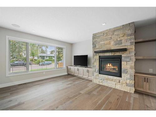 2836 12 Avenue Nw, Calgary, AB - Indoor Photo Showing Living Room With Fireplace