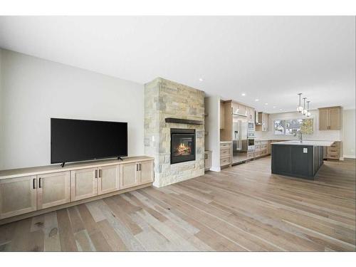 2836 12 Avenue Nw, Calgary, AB - Indoor Photo Showing Living Room With Fireplace