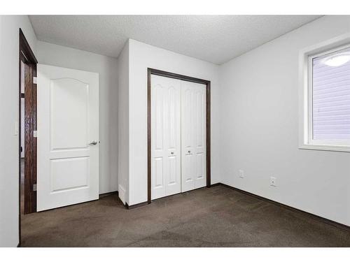 144 Evansborough Crescent Nw, Calgary, AB - Indoor Photo Showing Other Room