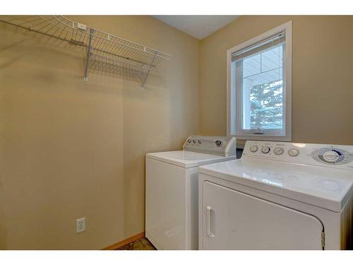 1342 Somerside Drive Sw, Calgary, AB - Indoor Photo Showing Laundry Room