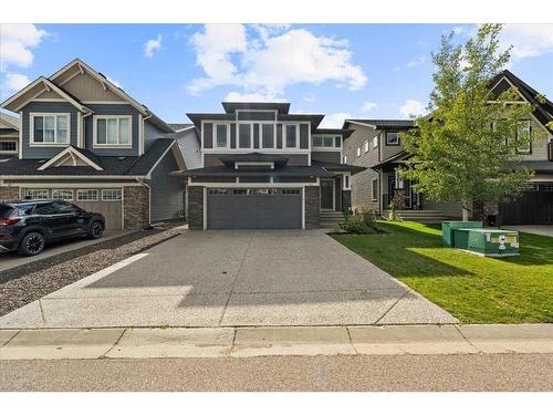 11 Storm Mountain Place, Okotoks, AB - Outdoor With Facade