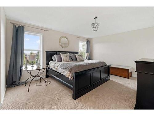 11 Storm Mountain Place, Okotoks, AB - Indoor Photo Showing Bedroom