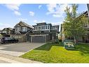 11 Storm Mountain Place, Okotoks, AB  - Outdoor With Facade 